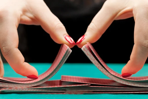 Shuffling playing cards — Stock Photo, Image