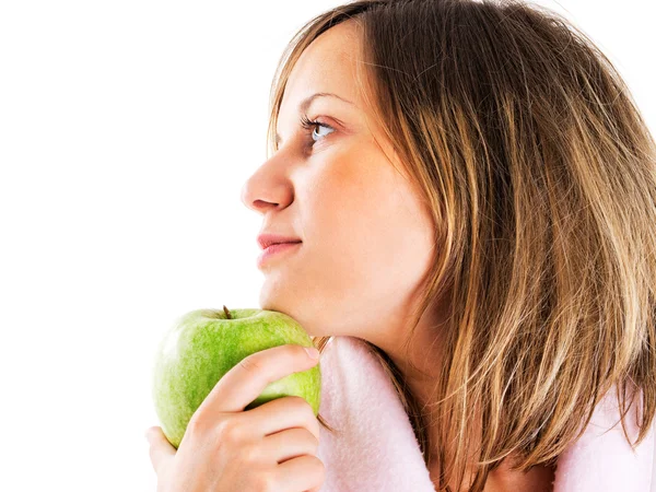 Mujer en casa con manzana —  Fotos de Stock