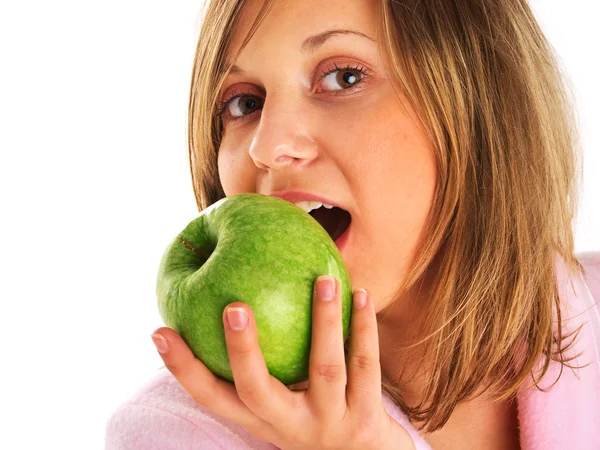 Mujer en casa con manzana —  Fotos de Stock