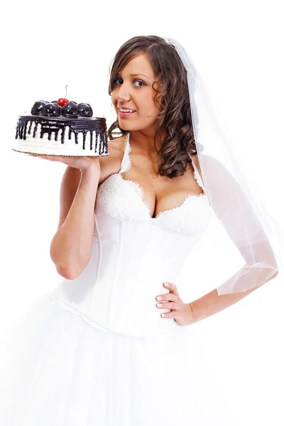 Giovane sposa mangiare torta — Foto Stock