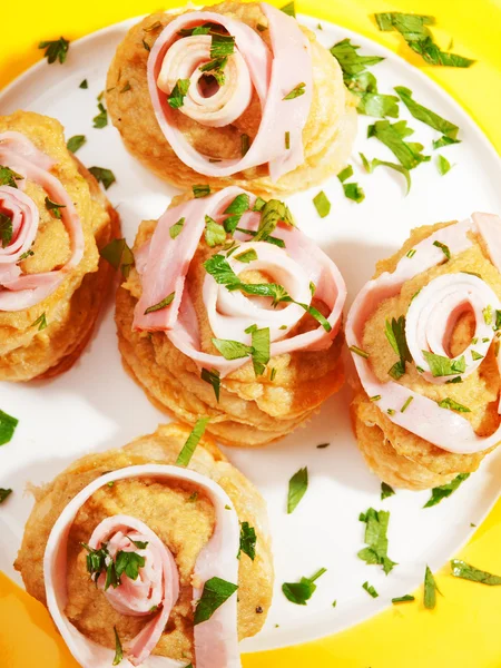 Appetizers on yellow plate — Stock Photo, Image