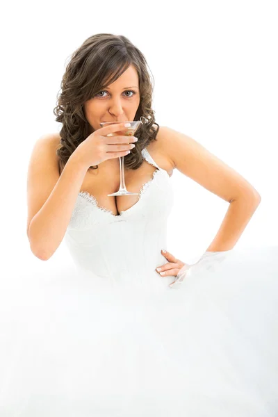 Young bride drinking martini — Stock Photo, Image