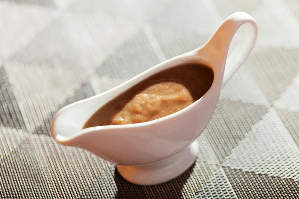 Mushroom sauce in gravy boat — Stock Photo, Image