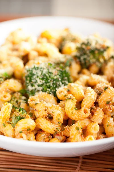 Pasta with broccoli and tomato sauce — Stock Photo, Image