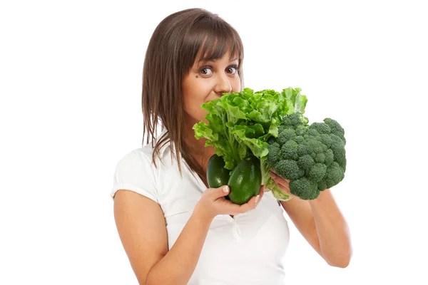 Young woman holding broccoli — Stock Photo, Image