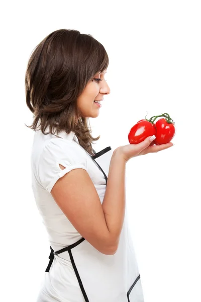 Giovane donna con pomodori — Foto Stock