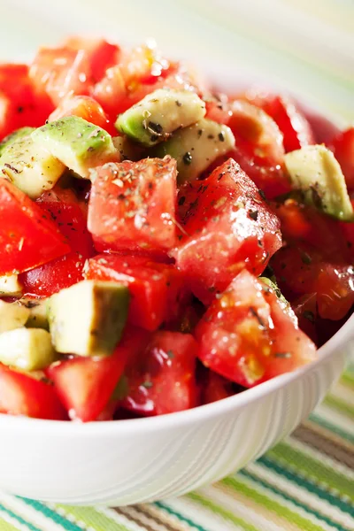 Tomato and avocado salad — Stock Photo, Image