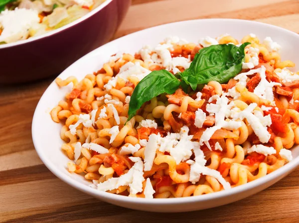 Pasta with tomatoes and cheese — Stock Photo, Image