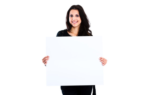 Young woman holding blank board