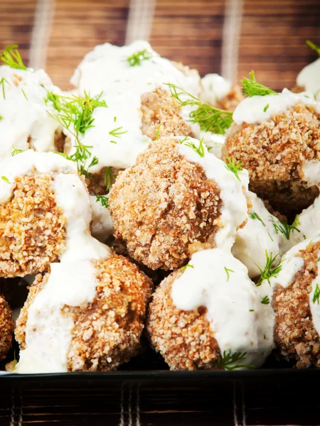 Meatballs with white sauce — Stock Photo, Image