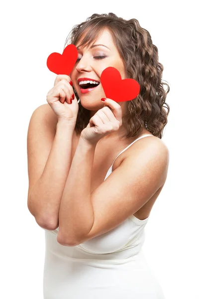 Young woman holding red hearts — Stock Photo, Image