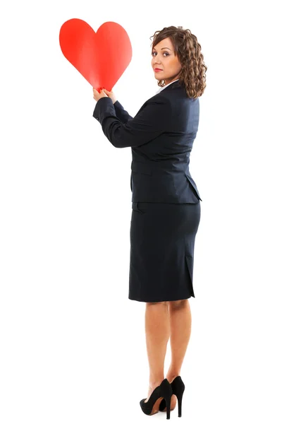 Empresária segurando coração papel vermelho — Fotografia de Stock