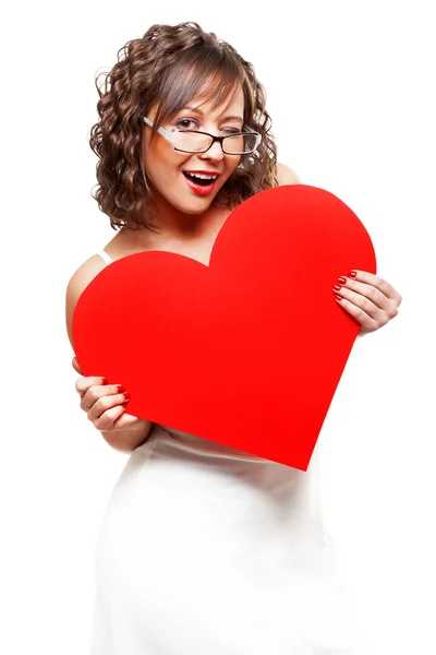 Attractive woman holding red heart — Stock Photo, Image