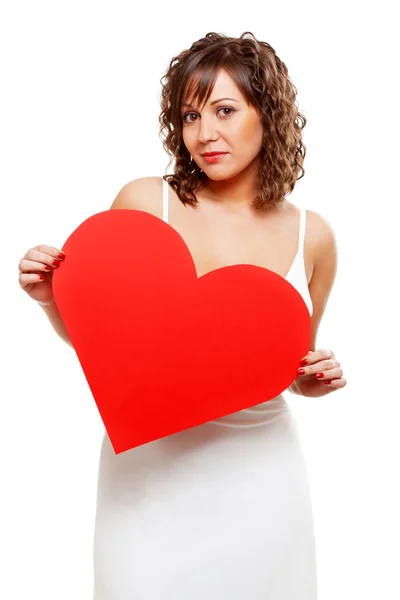 Attractive woman holding red heart — Stock Photo, Image