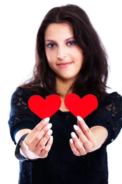 Young woman with red hearts — Stock Photo, Image