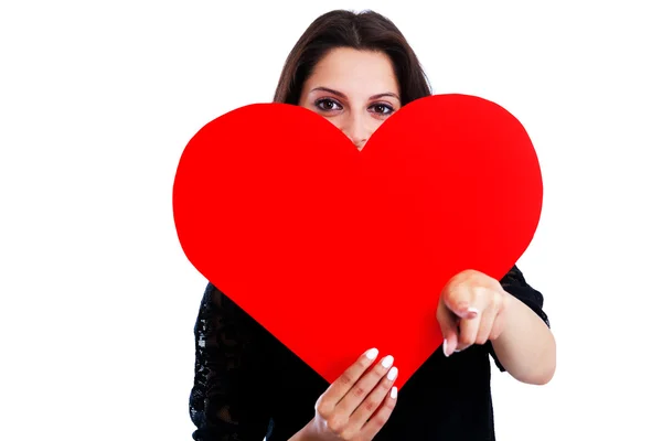 Mladá žena s červeným srdcem — Stock fotografie