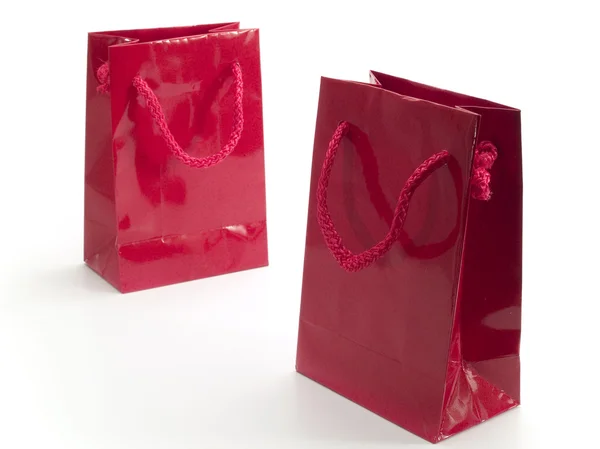 Två röda presenterar väska — Stockfoto