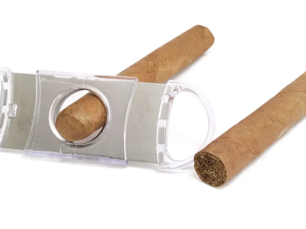 Cigars with cutter on white — Stock Photo, Image