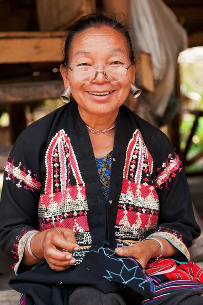 Old Thai woman with large earings — Stock Photo, Image