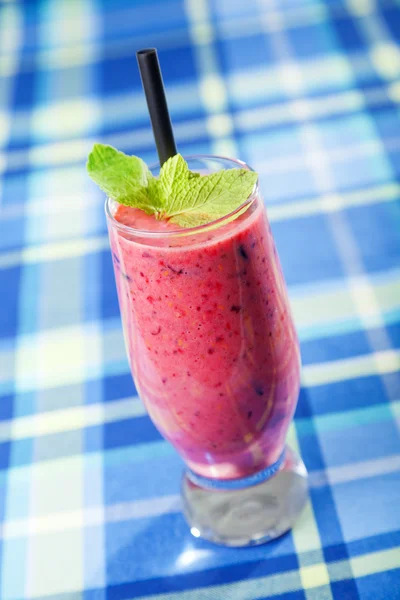 Glass of raspberry milkshake — Stock Photo, Image