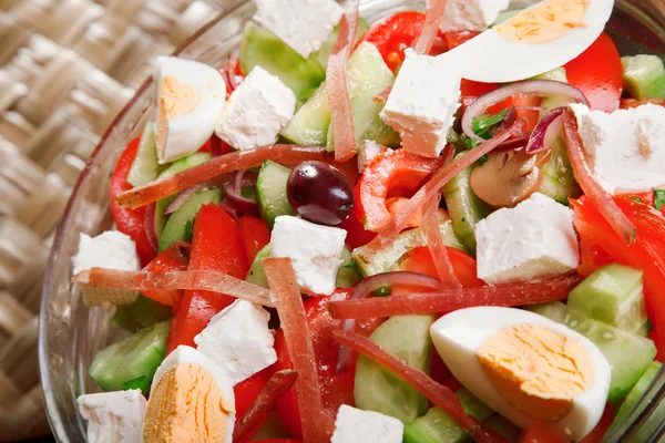 Salad with tomato, eggs, cucumbers and cheese — Stock Photo, Image