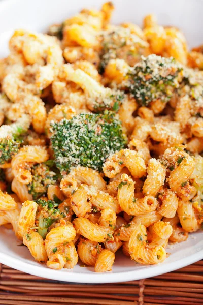 Pasta with broccoli and tomato sauce — Stock Photo, Image