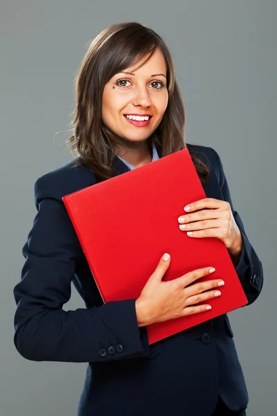 Zakenvrouw houden mappen en glimlachen — Stockfoto