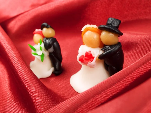 Figuras de casamento em vermelho — Fotografia de Stock