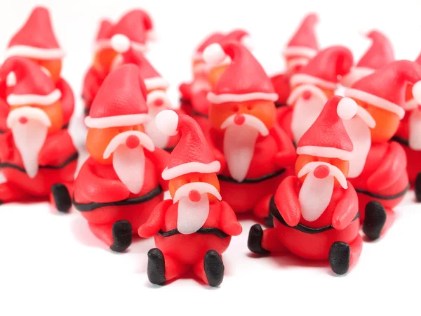 Clay Santas on white — Stock Photo, Image