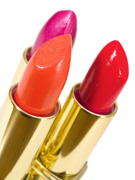 Drie lippenstiften geïsoleerd op wit — Stockfoto