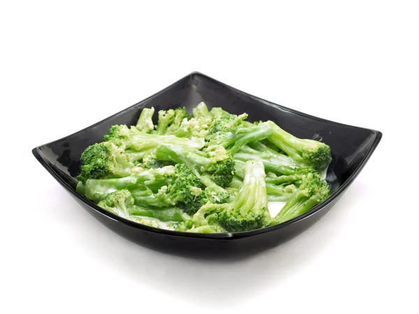 Broccoli con crema sul piatto — Foto Stock