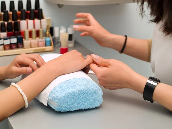 Girl's fingernails being manicured. — Stock Photo, Image