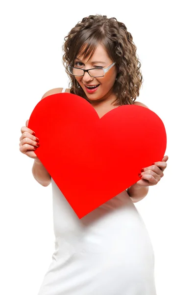 Young woman holding red heart — Stock Photo, Image