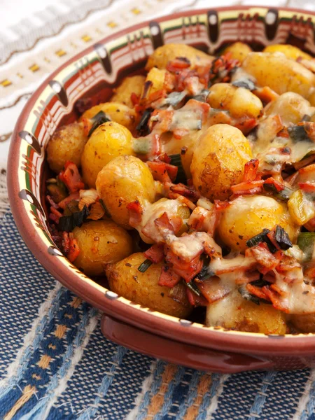 Baked potatoes with ham — Stock Photo, Image
