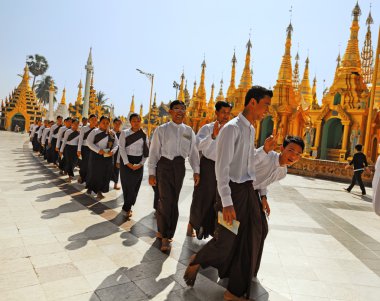 Burmese students in Shwedagon Pagoda clipart