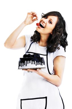 Çikolatalı pasta yiyen kadın.