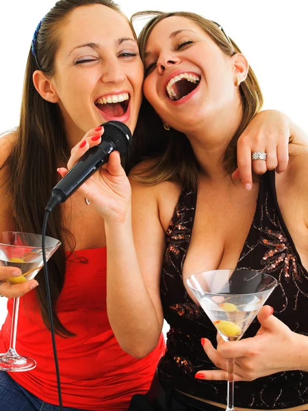 Girls singing with martini glasses — Stock Photo, Image