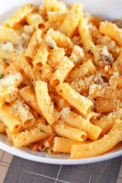 Penne with tomatoes and cheese — Stock Photo, Image