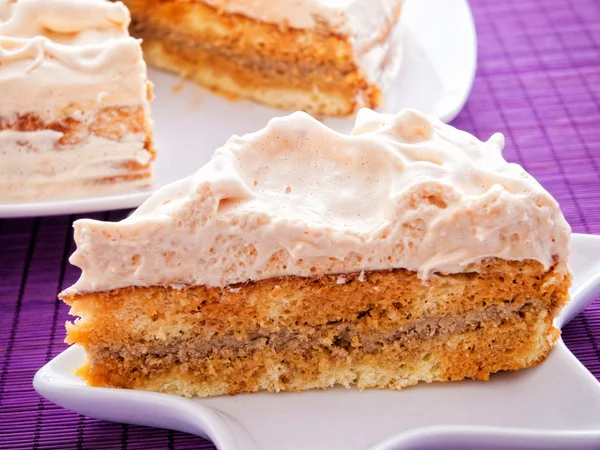 Cake with vanilla frosting — Stock Photo, Image