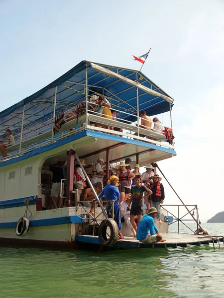 Small tour ship with people — Stock Photo, Image