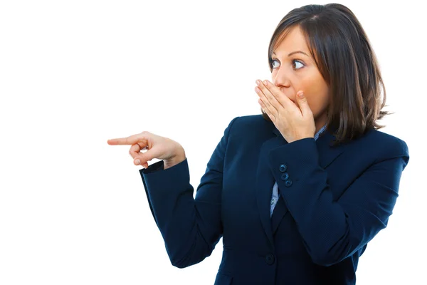 Femme d'affaires pointant du doigt et riant secrètement — Photo