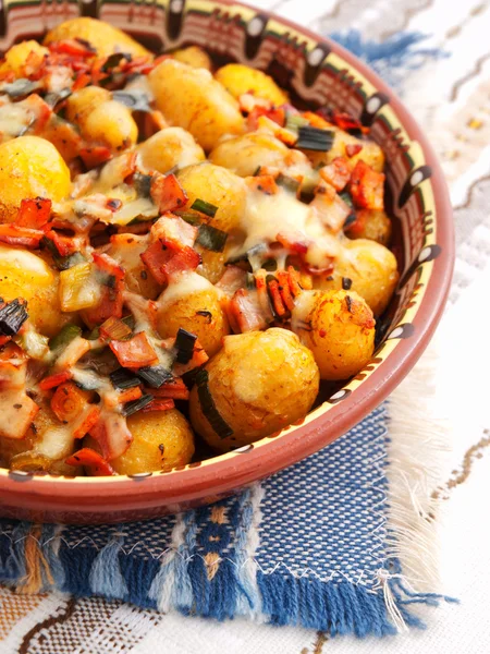 Baked potatoes with ham and cheese — Stock Photo, Image