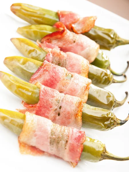 Grilled jalapenos wrapped in bacon — Stock Photo, Image