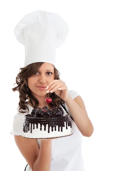 Повар с шоколадным тортом — стоковое фото