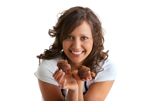 Young woman with chocolate muffins — Stock Photo, Image