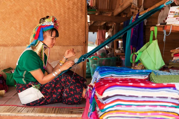 Young long-neck woman weaving — Stock Photo, Image