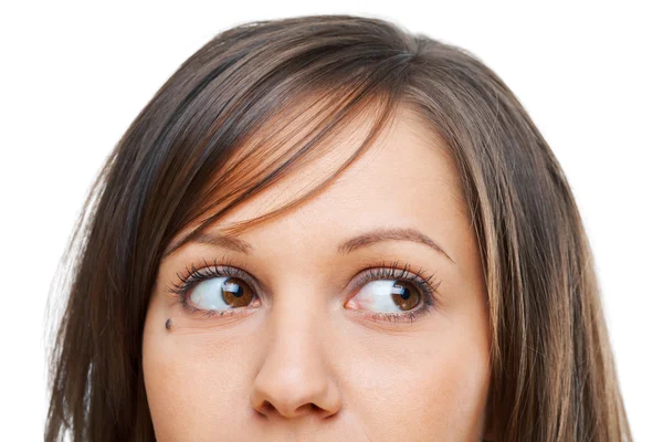 Joven mujer mirando hacia otro lado — Foto de Stock