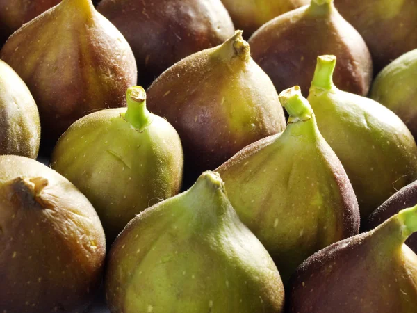 Lekker vijgen eten op achtergrond — Stockfoto