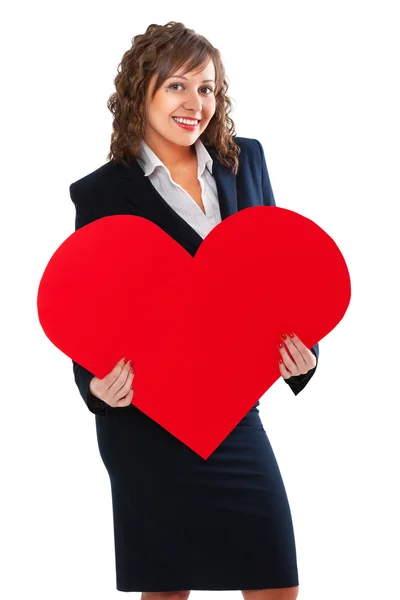 Businesswoman holding red paper heart — Stock Photo, Image