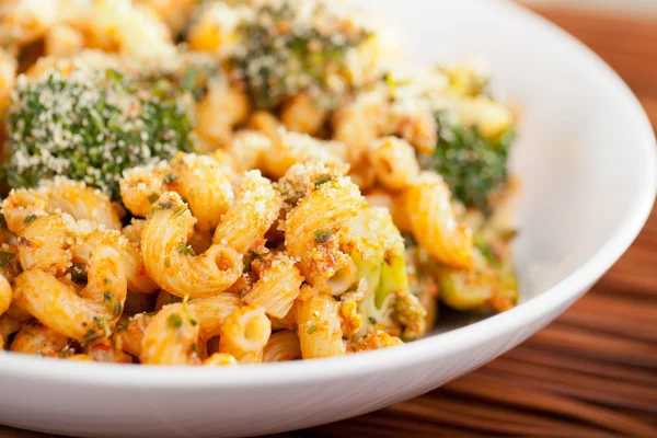 Pasta with broccoli and tomato sauce — Stock Photo, Image